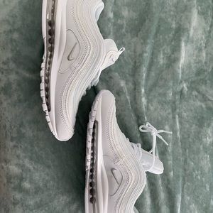 All white Nike shoes